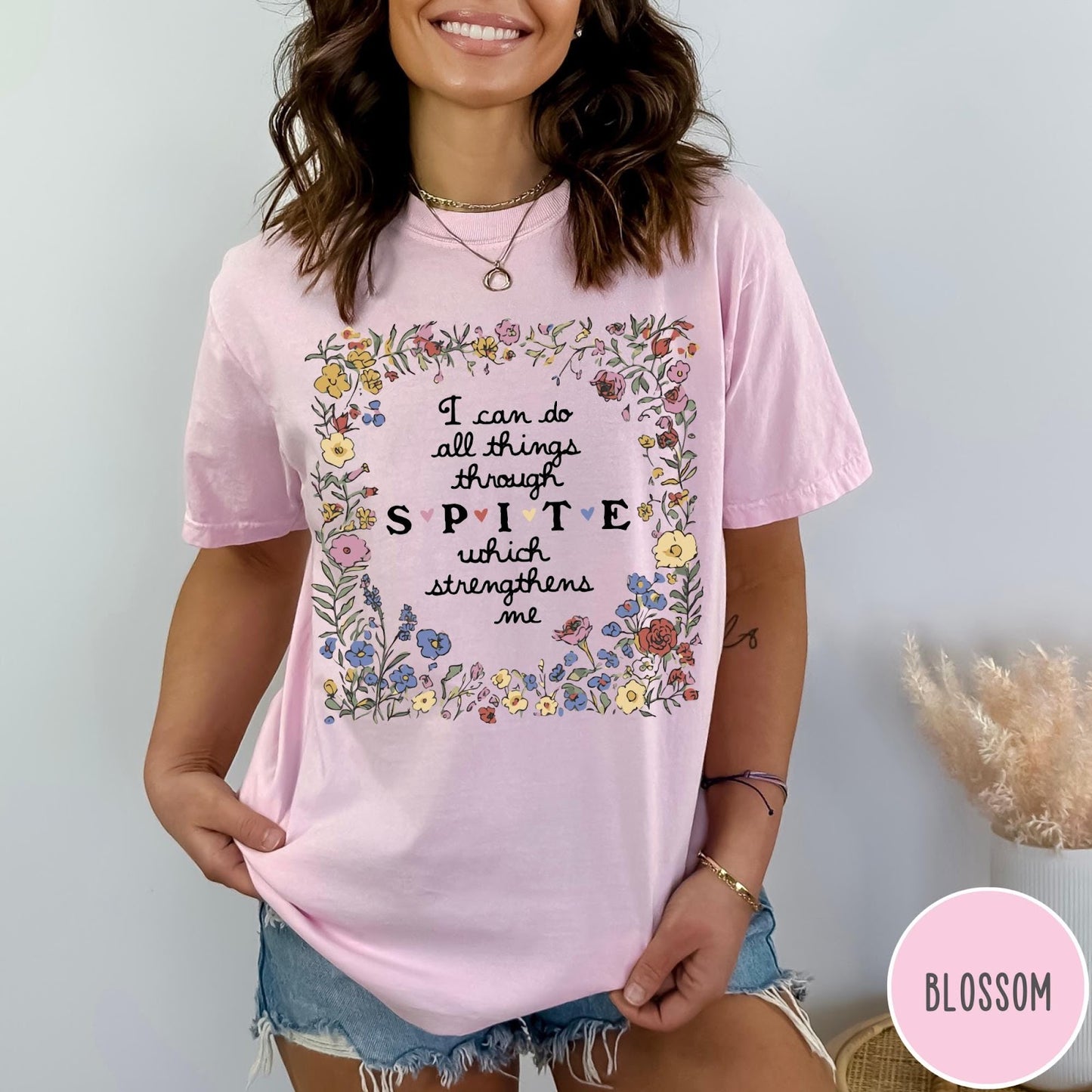 Comfort Colors tee in Blossom featuring sarcastic quote graphic with floral border and text about spite strengthening me