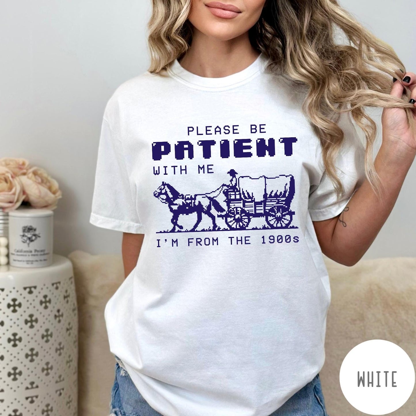 Comfort Colors tee in White featuring pixel art style graphic of a horse drawn covered wagon