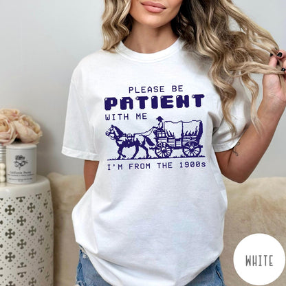 Comfort Colors tee in White featuring pixel art style graphic of a horse drawn covered wagon