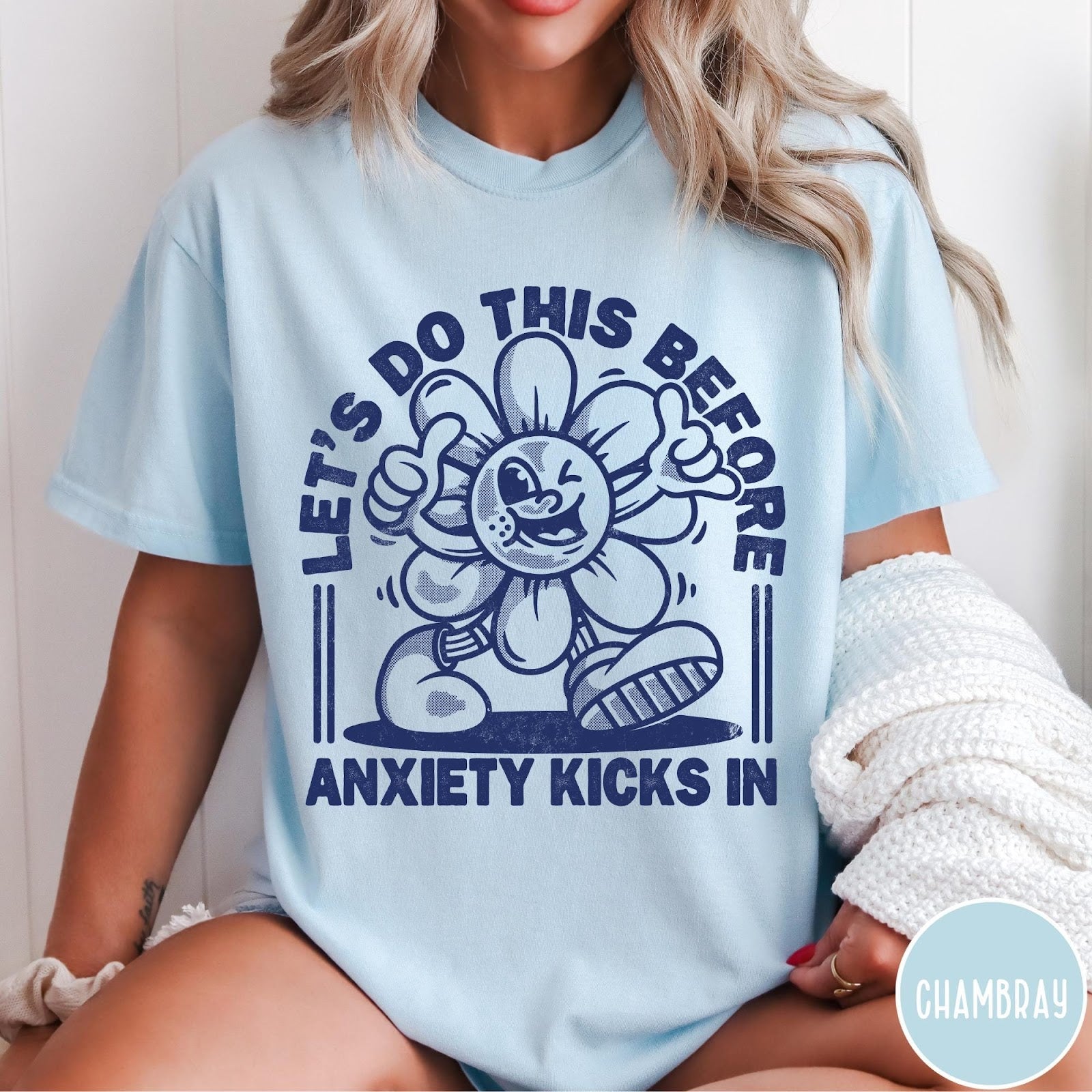 Comfort Colors tee in Chambray featuring retro graphic style winking flower character with anxiety text design