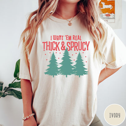 Comfort Colors tee in Ivory featuring Christmas tree design with text I Want Em Real Thick and Sprucy