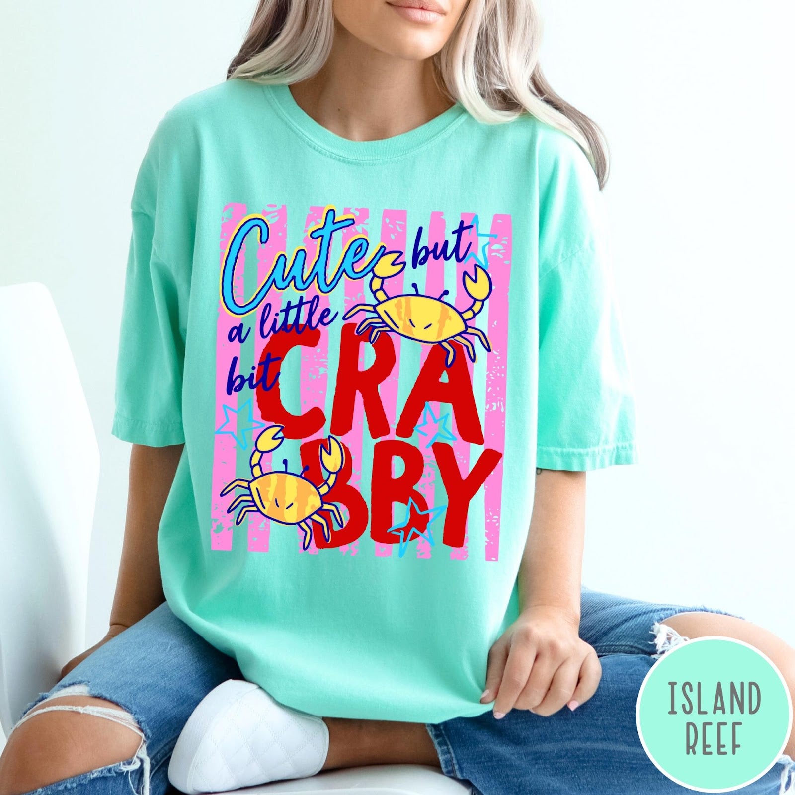 Comfort Colors tee in Island Reef featuring graphic design with crabs and text reading Cute but a little bit Crabby