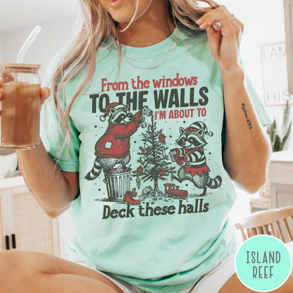 Comfort Colors tee in Island Reef featuring festive raccoon graphic with holiday lights and Christmas tree design.