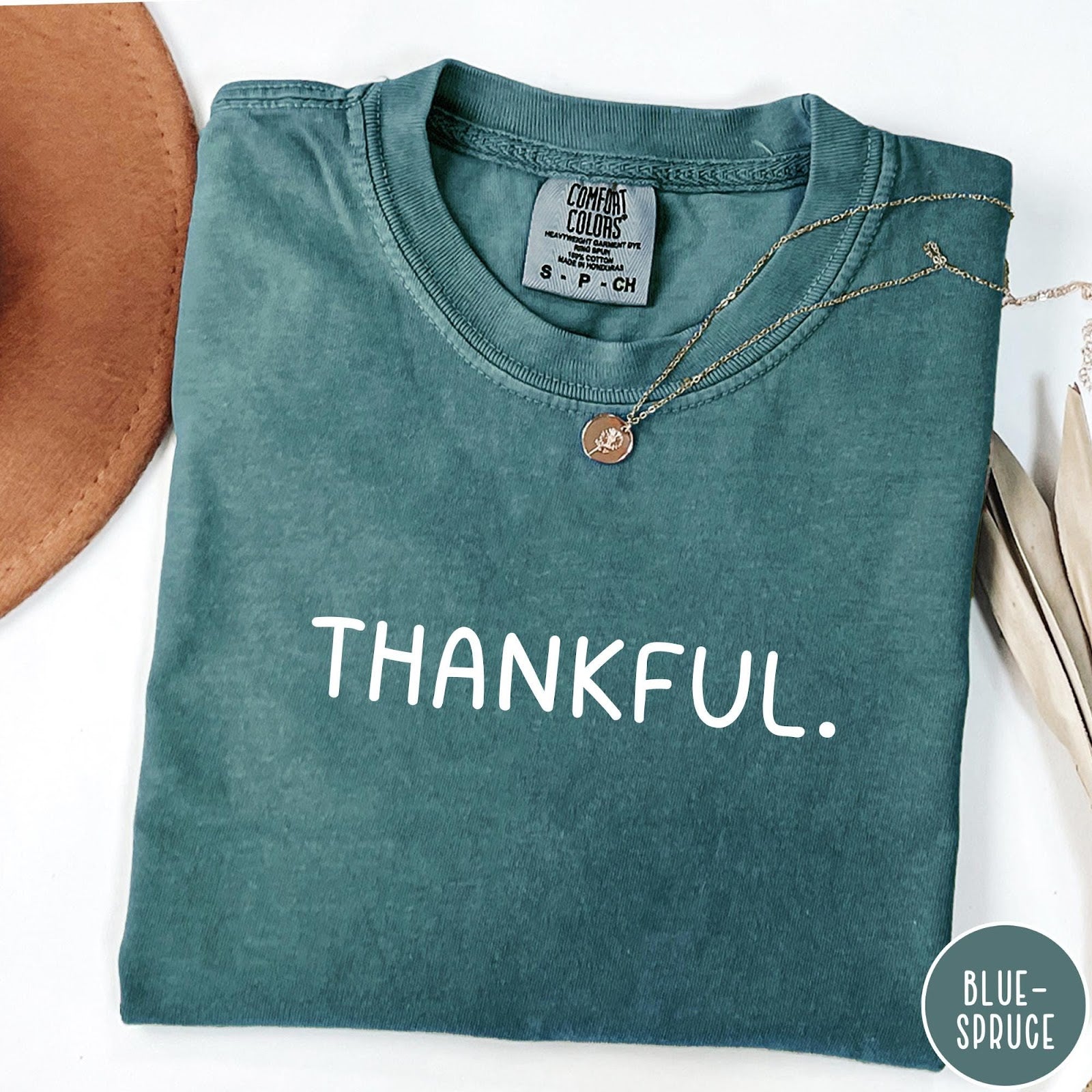 Comfort Colors tee in Blue Spruce featuring minimalist design with the word Thankful printed in white text