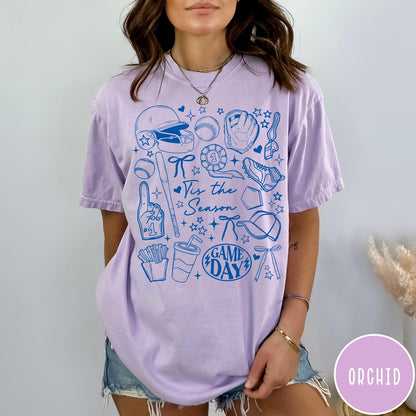 Comfort Colors tee in Orchid featuring baseball game day graphic with bat, helmet, and game day text
