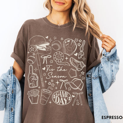 Comfort Colors tee in Espresso featuring baseball game day graphic with helmet, bat, ball, and snacks.