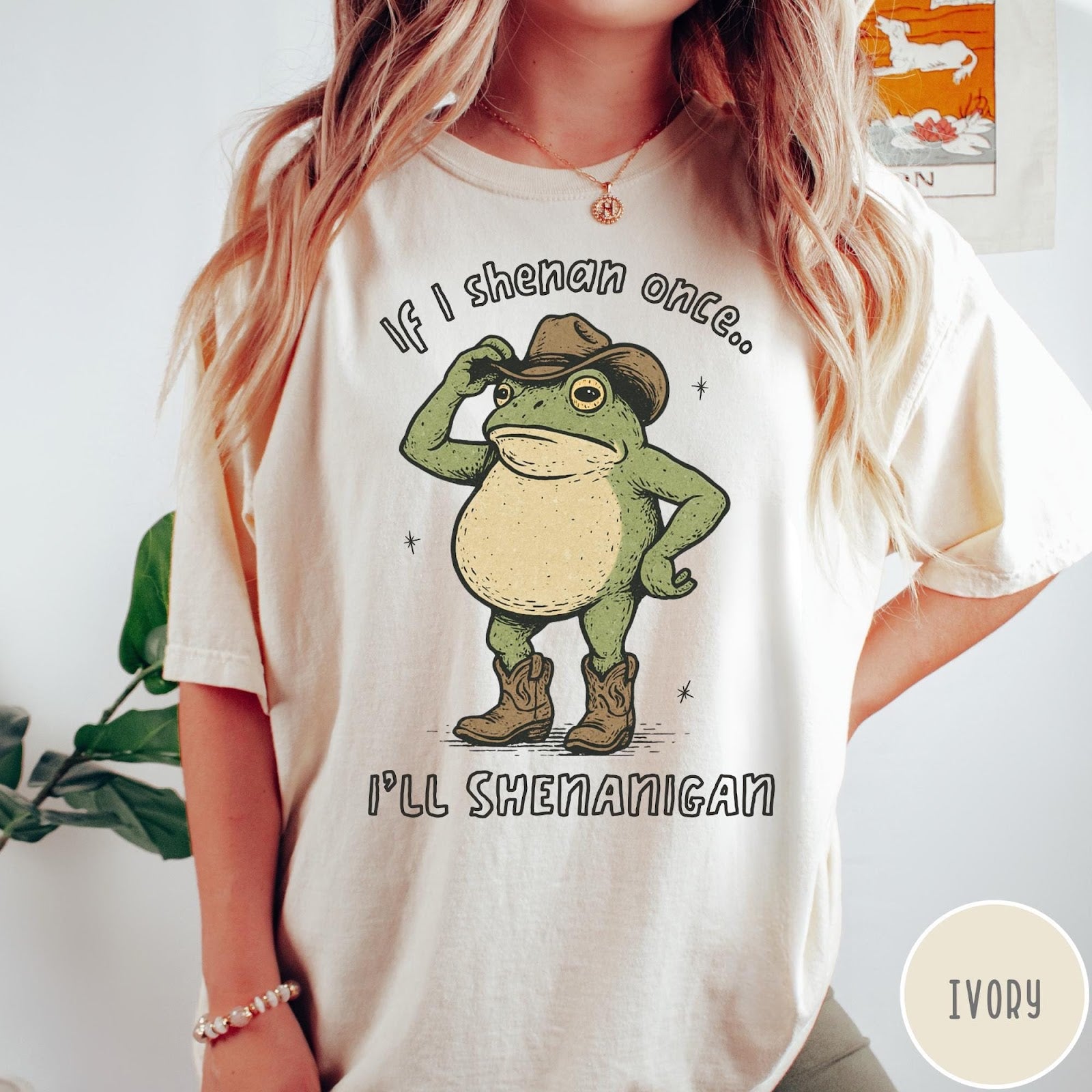 Comfort Colors tee in Ivory featuring western style graphic of a frog wearing a cowboy hat and boots