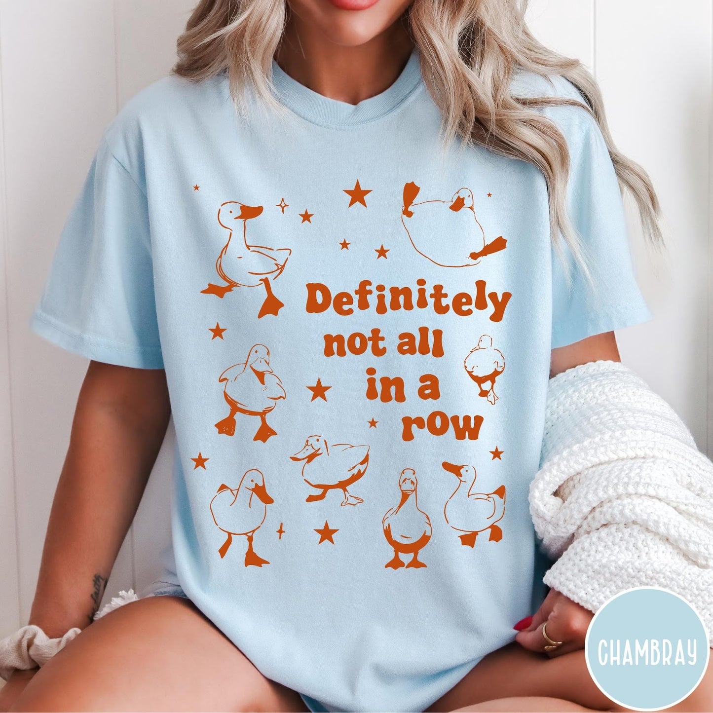 Comfort Colors tee in Chambray featuring whimsical duck design with scattered stars and text about ducks.