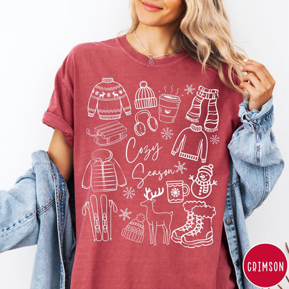 Comfort Colors tee in Crimson featuring line art winter activities and seasonal items graphic design