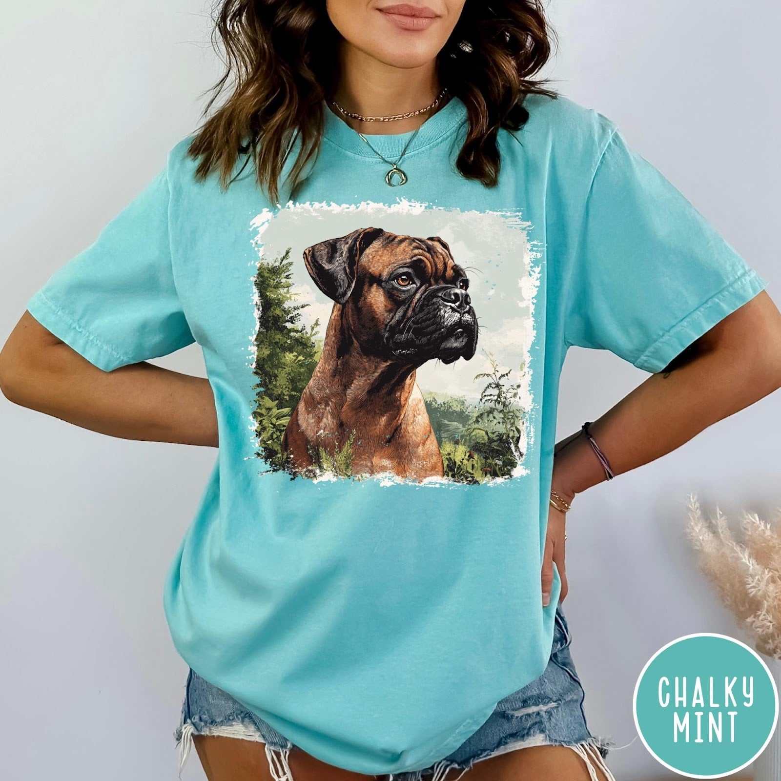 Comfort Colors tee in Chalky Mint featuring vintage style graphic of a Boxer dog in a forest setting