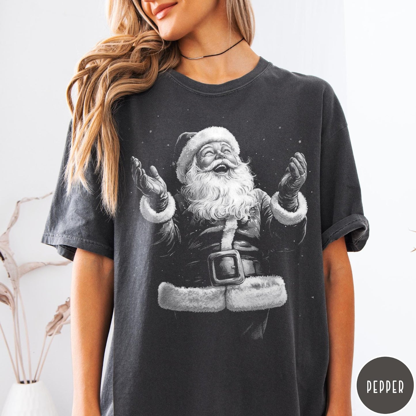 Comfort Colors tee in Pepper featuring vintage style graphic of a laughing Santa Claus with open arms