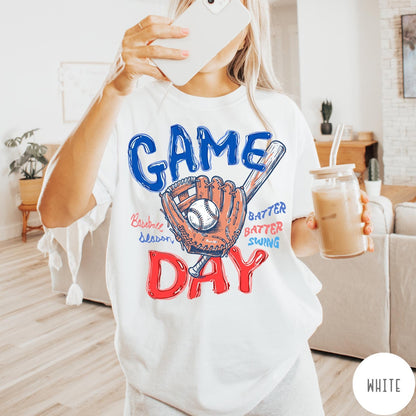 Comfort Colors tee in White featuring baseball design with glove, ball, bat, and Game Day text graphic