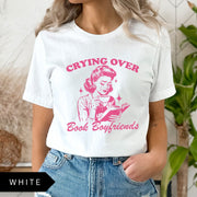 Comfort Colors tee in White featuring retro style graphic of a woman crying while reading a book