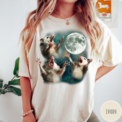 Comfort Colors tee in Ivory featuring vintage graphic style with three screaming possums reaching for the moon