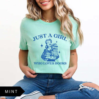 Comfort Colors tee in Mint featuring vintage style graphic of a girl holding a stack of books
