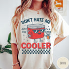 Comfort Colors tee in Ivory featuring retro cooler graphic with sunglasses and a drink with text