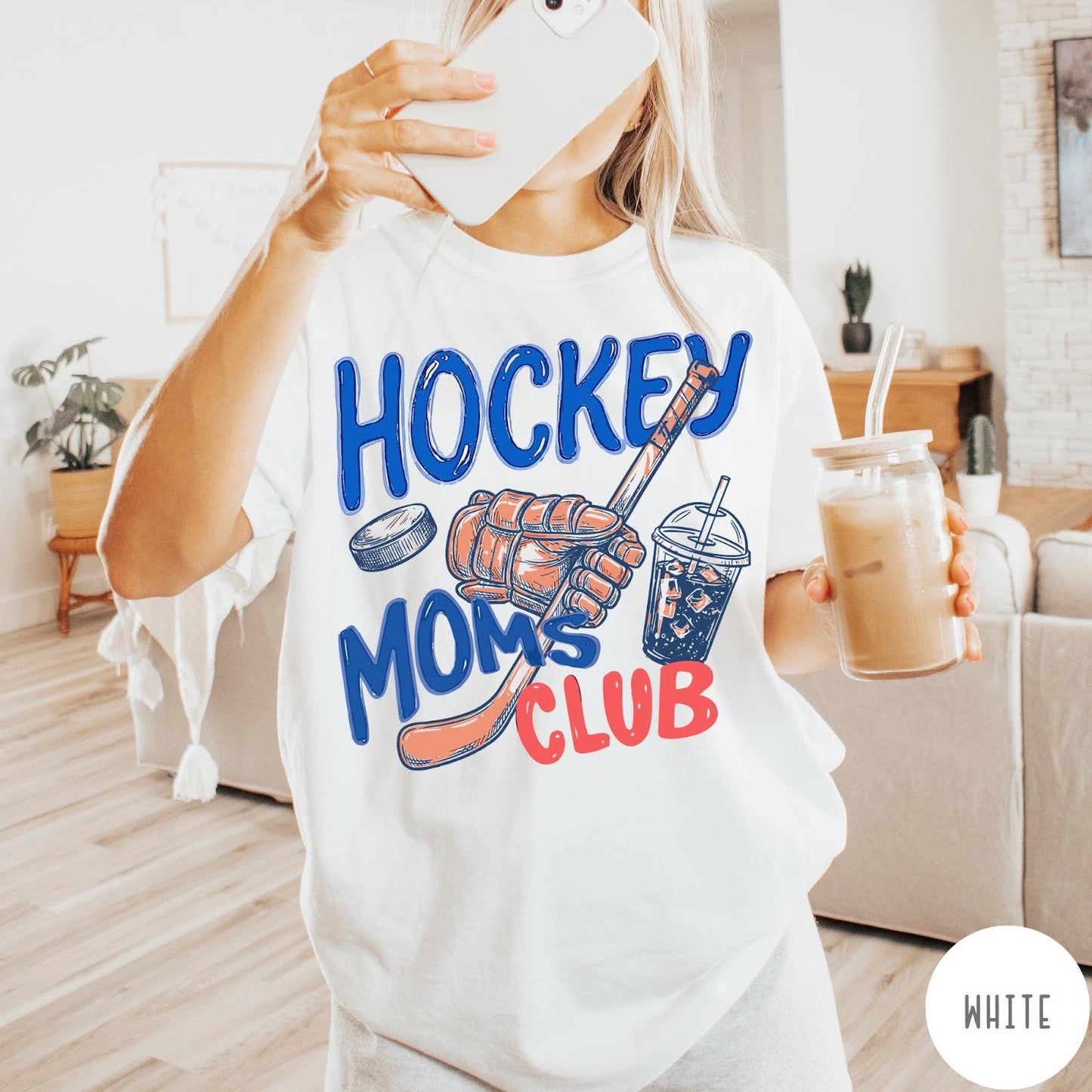 Comfort Colors tee in White featuring lifestyle graphic design with hockey glove, stick, puck, and iced coffee