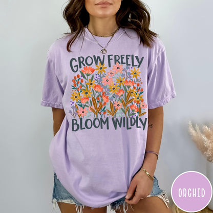 Comfort Colors tee in Orchid featuring wildflower design with colorful flowers and Grow Freely Bloom Wildly text