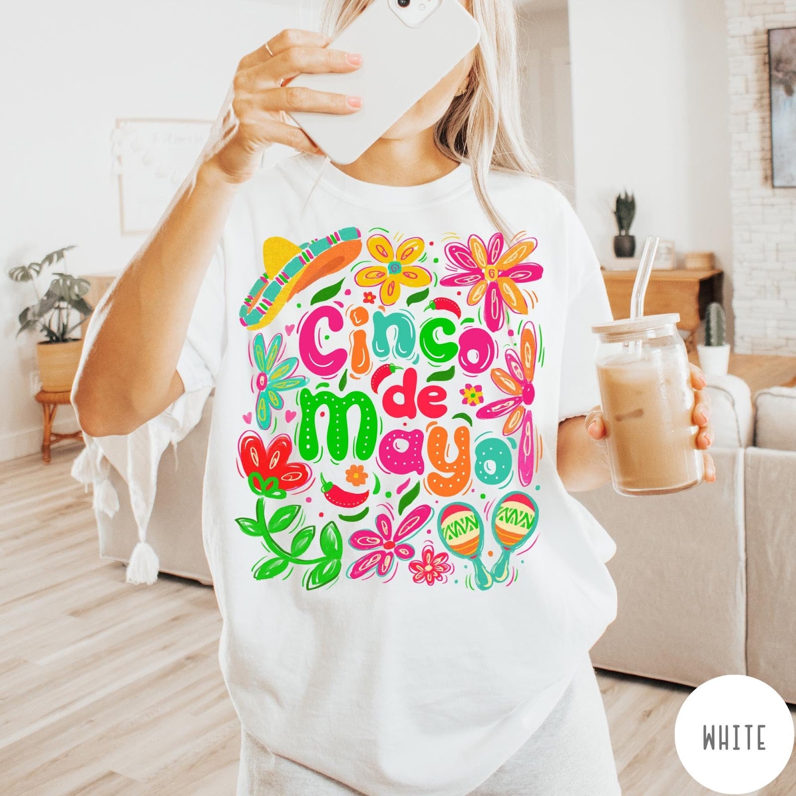 Comfort Colors tee in White featuring festive Cinco de Mayo graphic with sombrero, maracas, and colorful flowers