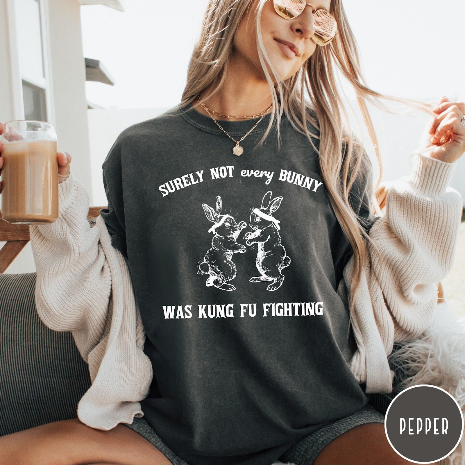 Comfort Colors tee in Pepper featuring vintage style graphic of two rabbits wearing headbands kung fu fighting