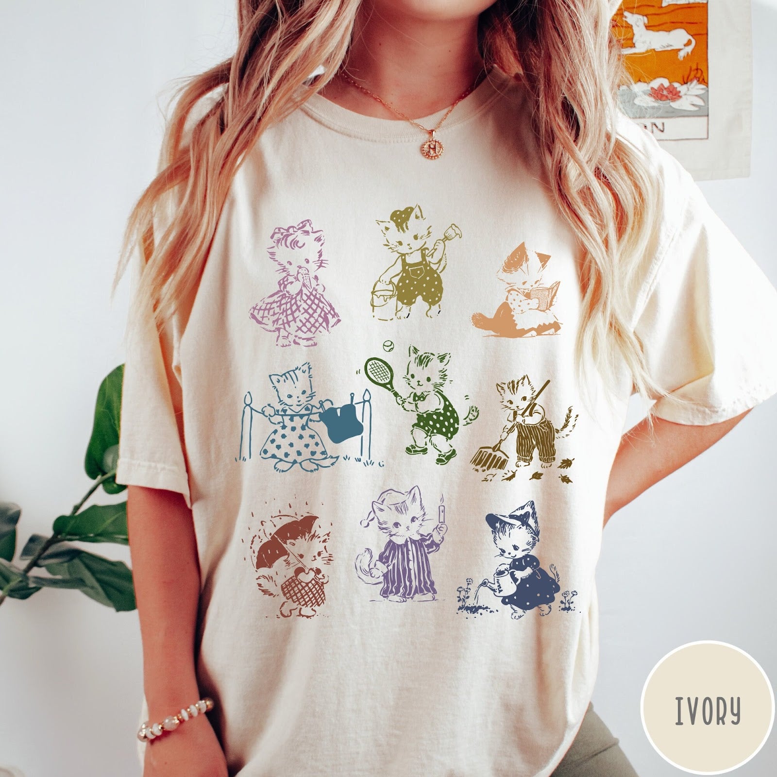 Comfort Colors tee in Ivory featuring vintage retro style graphic of nine kittens doing various daily activities