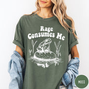 Comfort Colors tee in Moss featuring retro style graphic of a frog sitting on a rock