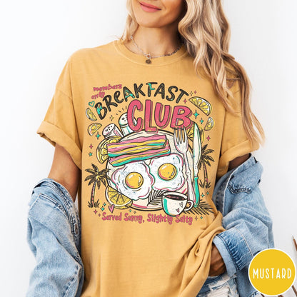 Comfort Colors tee in Mustard featuring retro breakfast food graphic with eggs, bacon, and coffee illustration