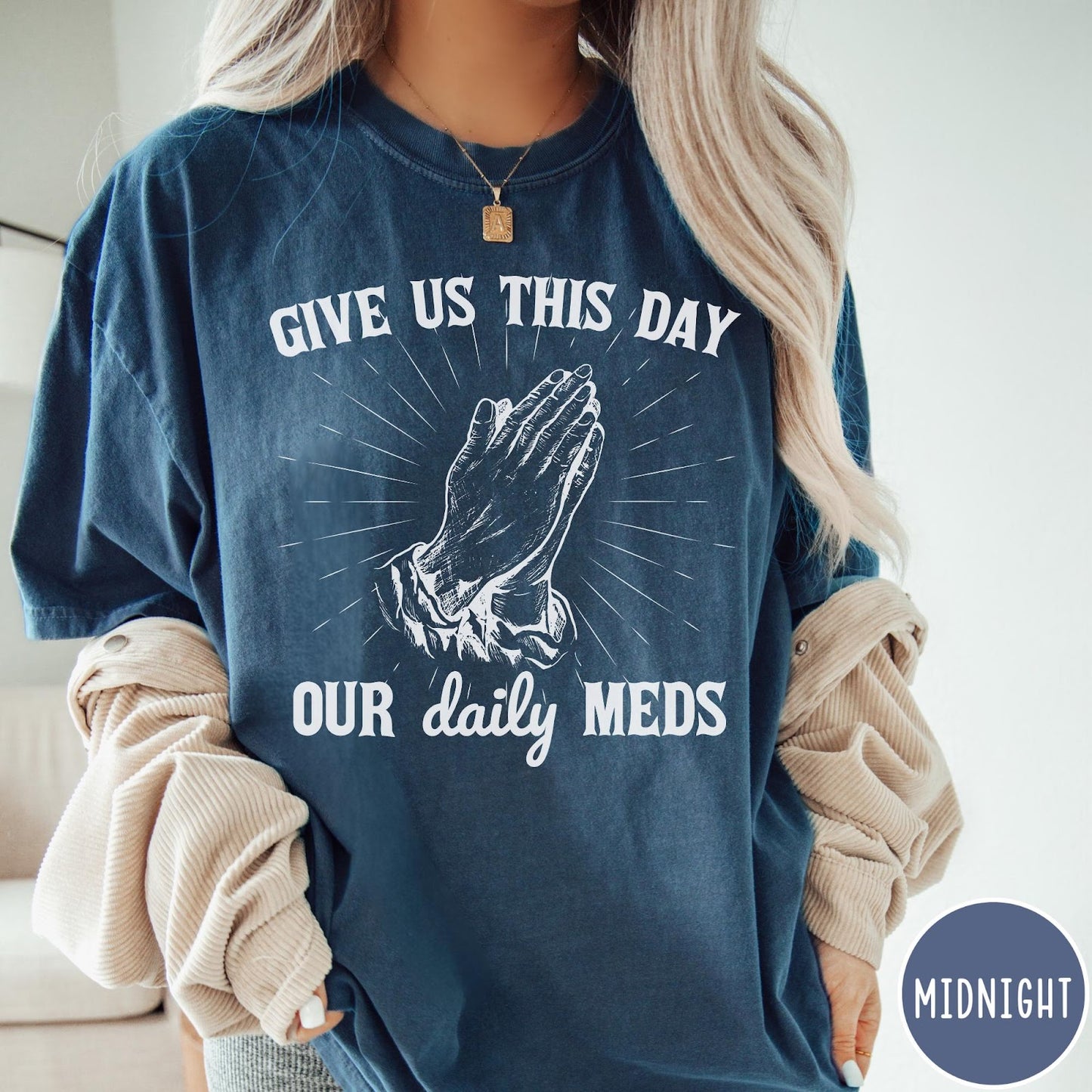 Comfort Colors tee in Midnight featuring graphic style praying hands with text Give Us This Day Our Daily Meds