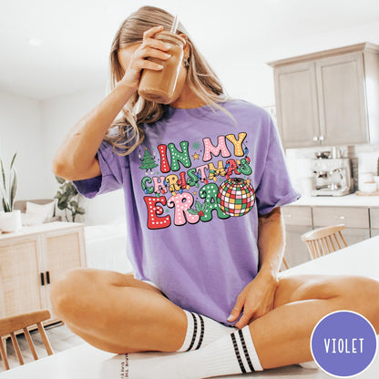 Comfort Colors tee in Violet featuring Christmas disco style graphic with festive tree and colorful disco ball