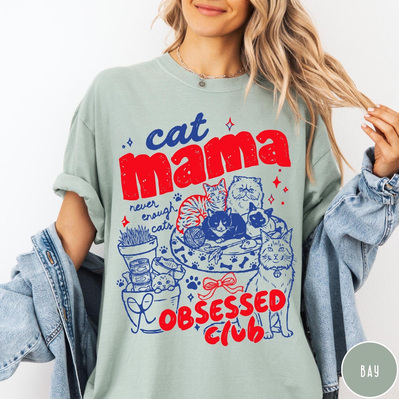 Comfort Colors tee in Bay featuring cat mama club graphic with multiple cats and red blue ink