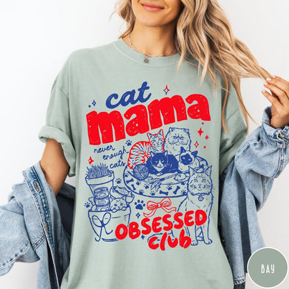 Comfort Colors tee in Bay featuring cat mama club graphic with multiple cats and red blue ink