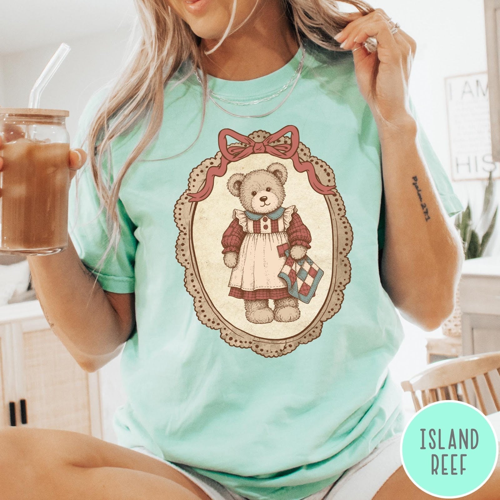 Comfort Colors tee in Island Reef featuring vintage style teddy bear graphic inside a decorative lace oval frame