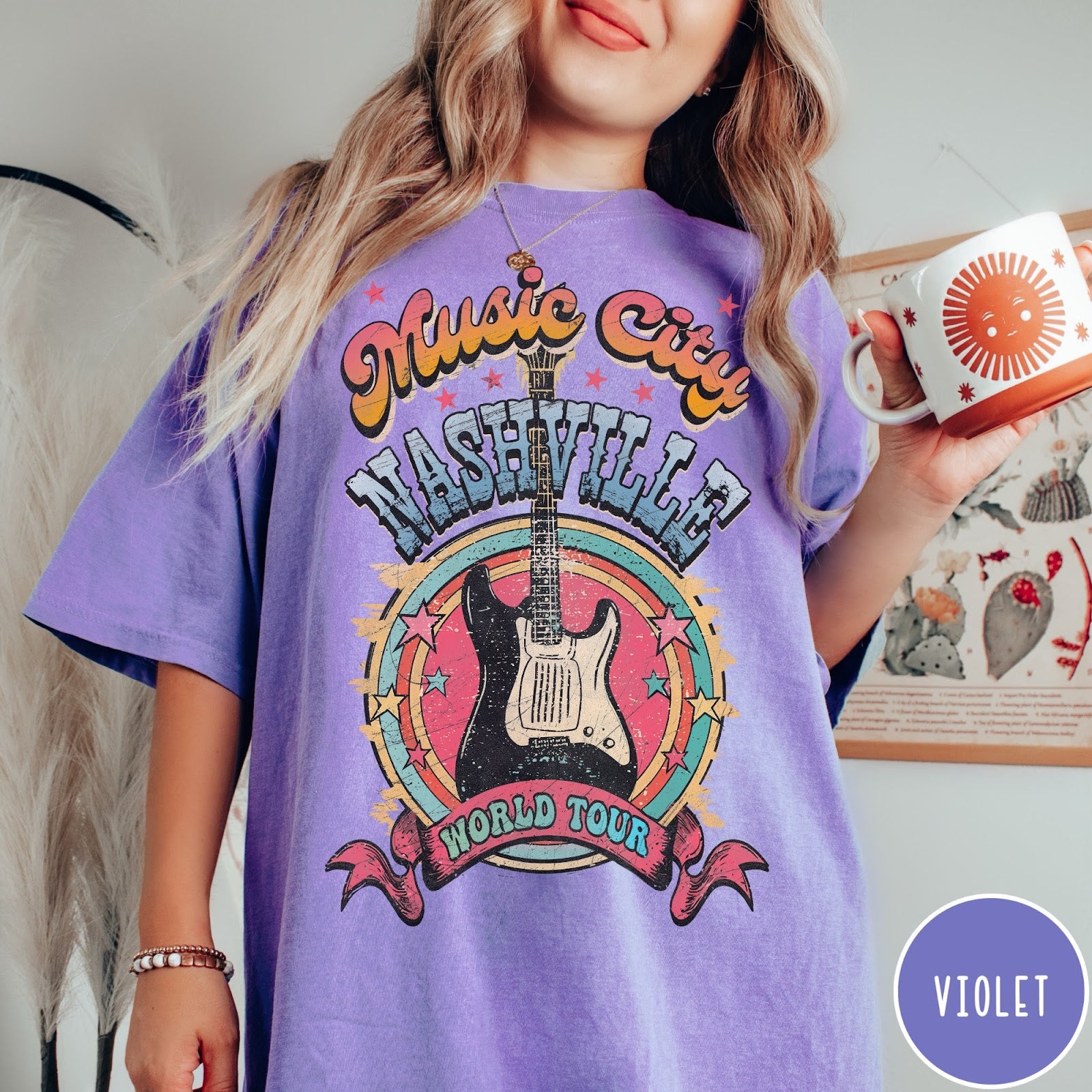 Comfort Colors tee in Violet featuring retro style Nashville Music City guitar graphic with colorful circular design