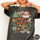Comfort Colors tee in Pepper featuring retro holiday design with Santa, reindeer, and Christmas icons.