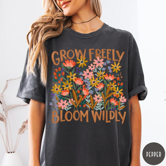 Comfort Colors tee in Pepper featuring wildflower design with colorful flowers and Grow Freely Bloom Wildly text