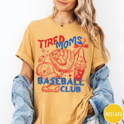 Comfort Colors tee in Mustard featuring baseball mom life graphic with glove, ball, cap, and iced coffee