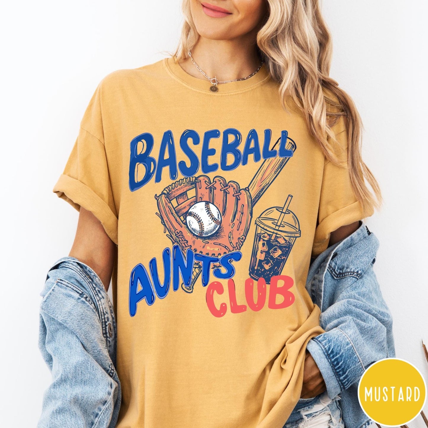 Comfort Colors tee in Mustard featuring baseball graphic with a mitt, ball, bat, and iced coffee drink