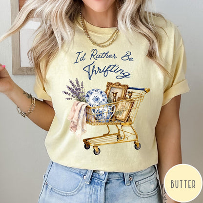 Comfort Colors tee in Butter featuring vintage style graphic of a shopping cart filled with antique decor items