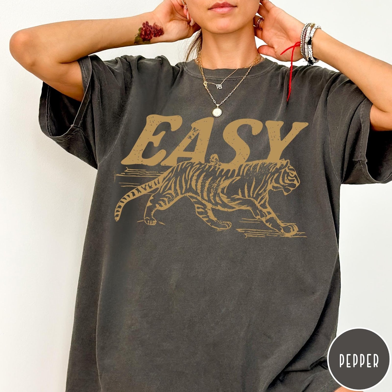 Comfort Colors tee in Pepper featuring vintage style graphic of a tiger and the word Easy