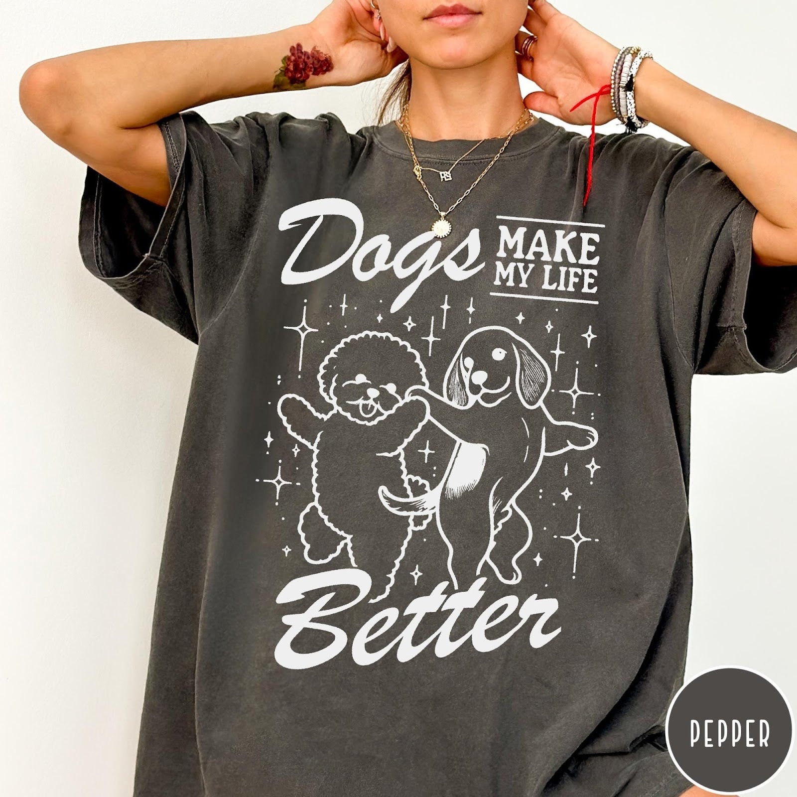 Comfort Colors tee in Pepper featuring line art graphic of two dogs dancing with stars and text