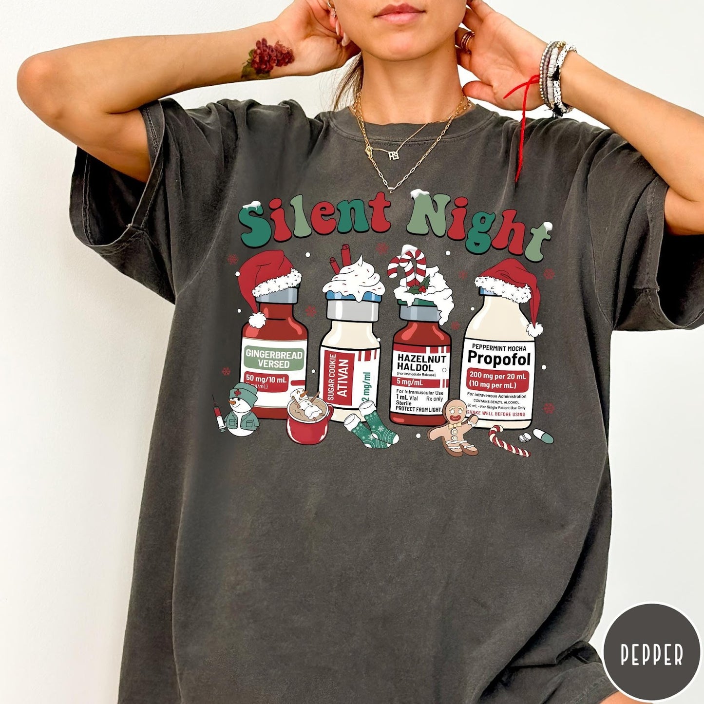 Comfort Colors tee in Pepper featuring holiday graphic with medical vials styled as festive holiday treats