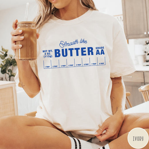 Comfort Colors tee in Ivory featuring a graphic design of a butter wrapper with measurements and text.