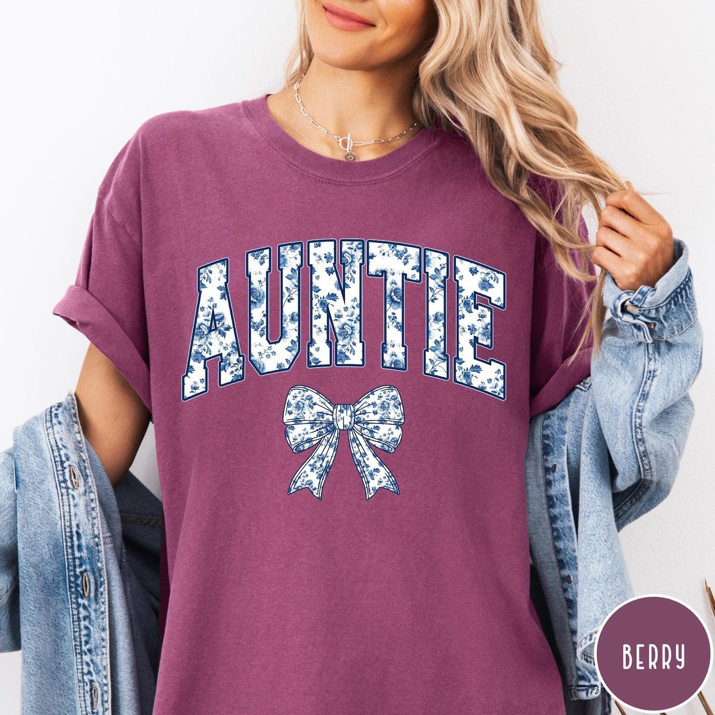 Comfort Colors tee in Berry featuring floral bow graphic with the word Auntie in blue floral print