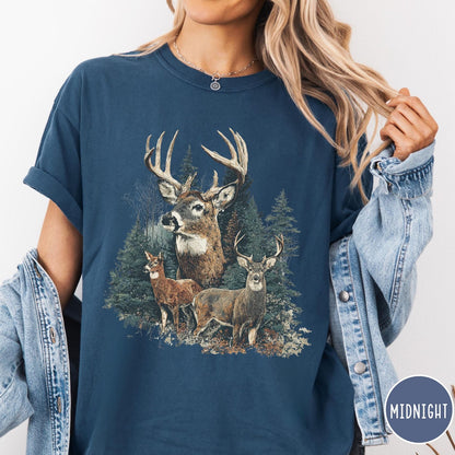 Comfort Colors tee in Midnight featuring vintage style graphic of deer in a forest