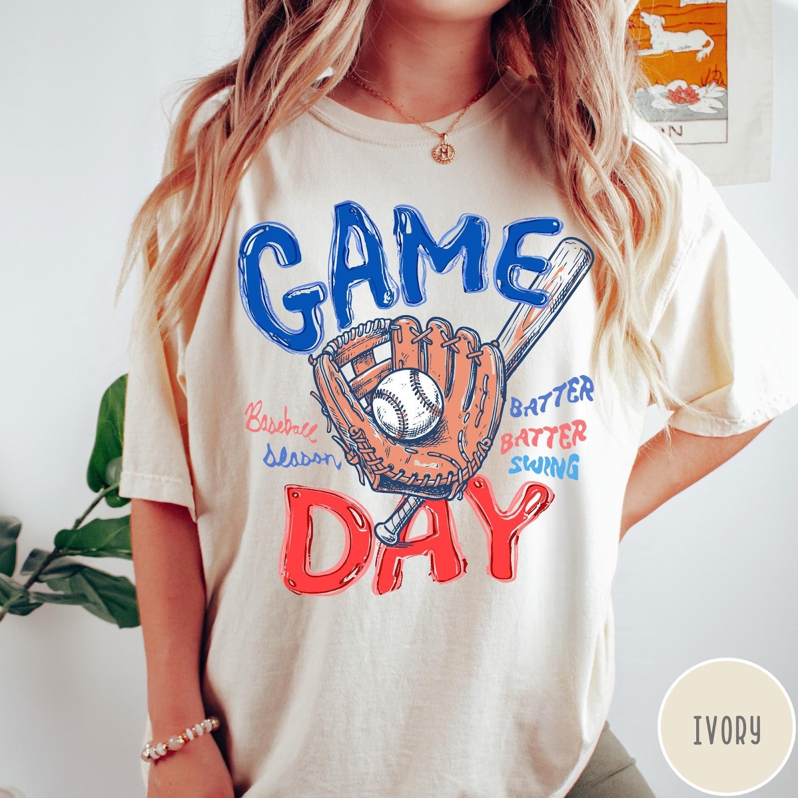 Comfort Colors tee in Ivory featuring baseball design with glove, ball, bat, and Game Day text graphic