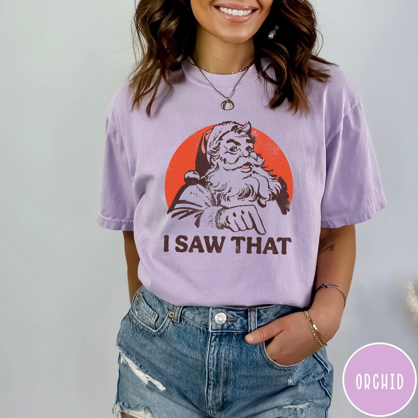 Comfort Colors tee in Orchid featuring vintage style Santa Claus graphic with text I Saw That