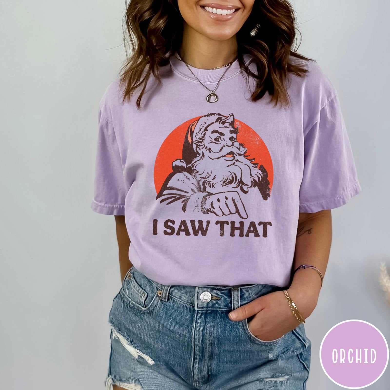 Comfort Colors tee in Orchid featuring vintage style Santa Claus graphic with text I Saw That