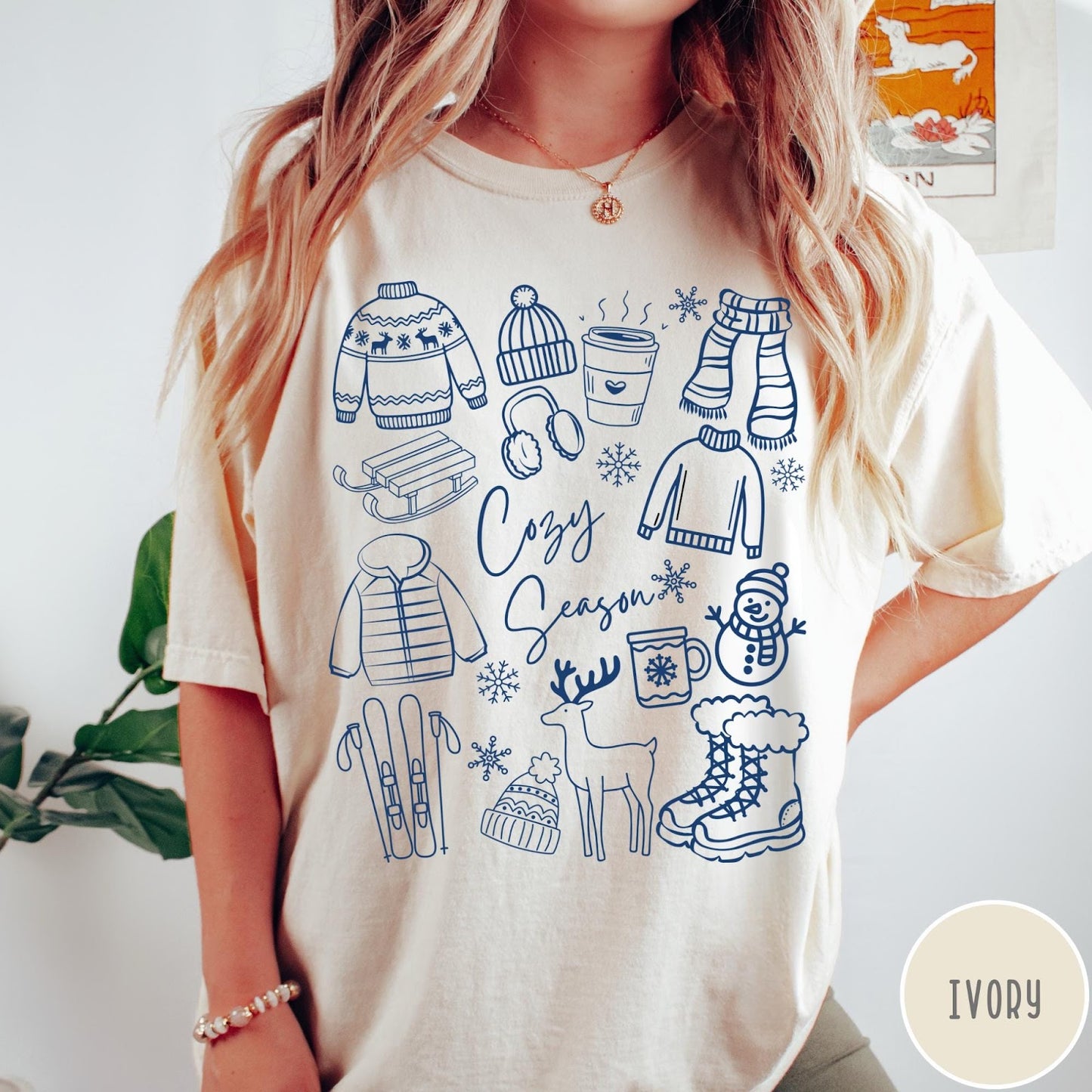Comfort Colors tee in Ivory featuring line art winter activities and seasonal items graphic design