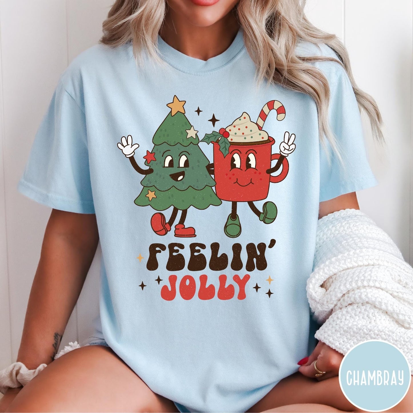 Comfort Colors tee in Chambray featuring retro style graphic of a cartoon Christmas tree and cocoa mug