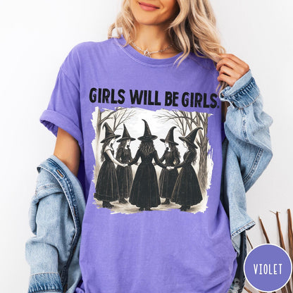 Comfort Colors tee in Violet featuring vintage style graphic of five witches holding hands in a circle